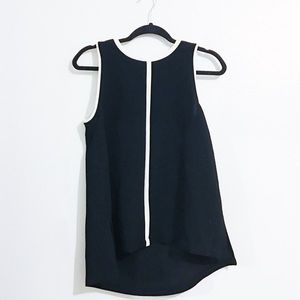 NWOT black sleeveless blouse with white lines